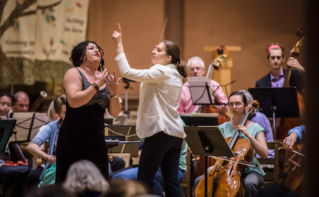 Lidiya Yankovskaya conducting with soprano Olga Lisovska, who has sang with the orchestra since its founding. (Courtesy Refugee Orchestra Project)