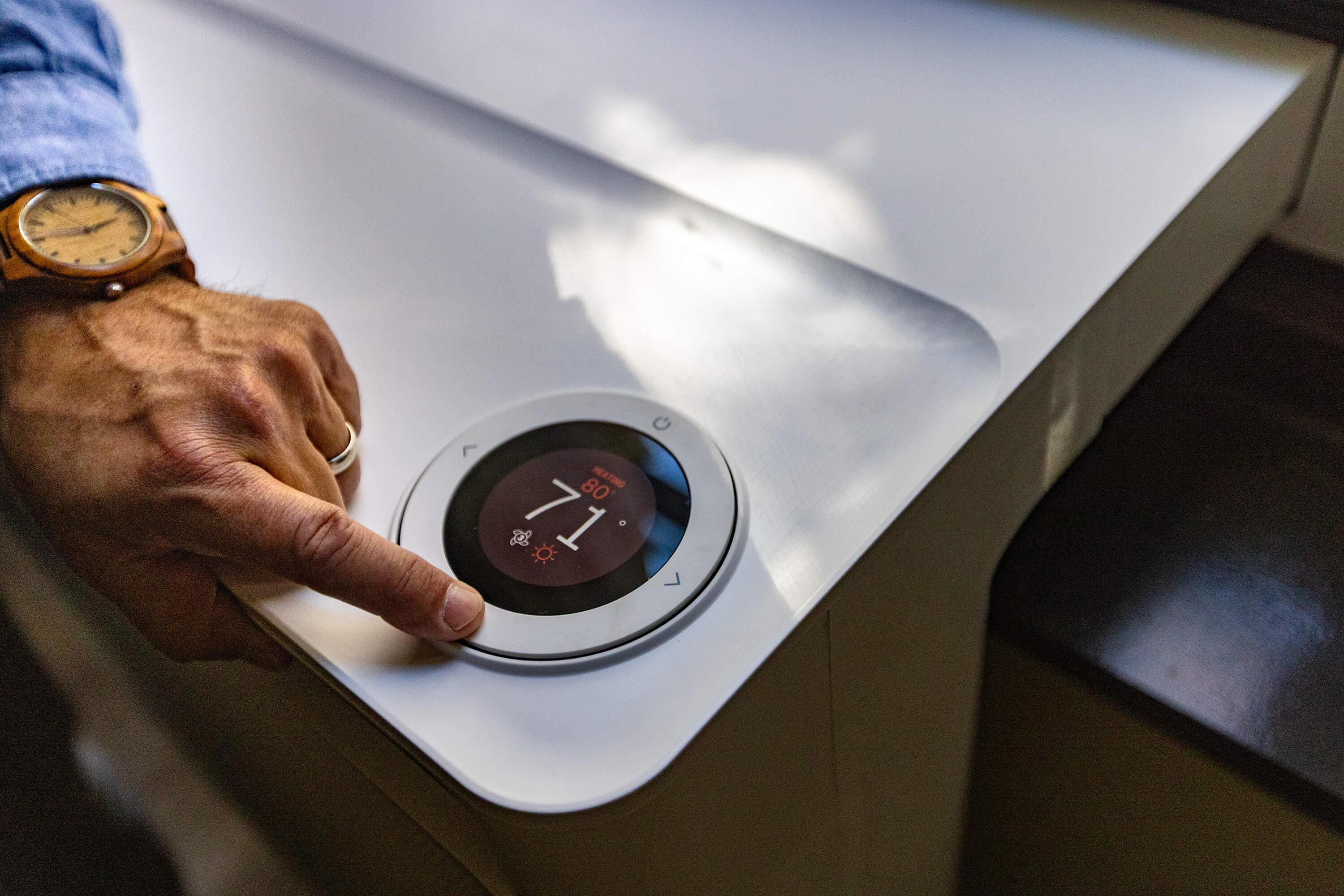 The display controller on one of the newly installed Gradient window-mounted heat pump units at the Hassan Apartments in Mattapan. (Jesse Costa/WBUR)