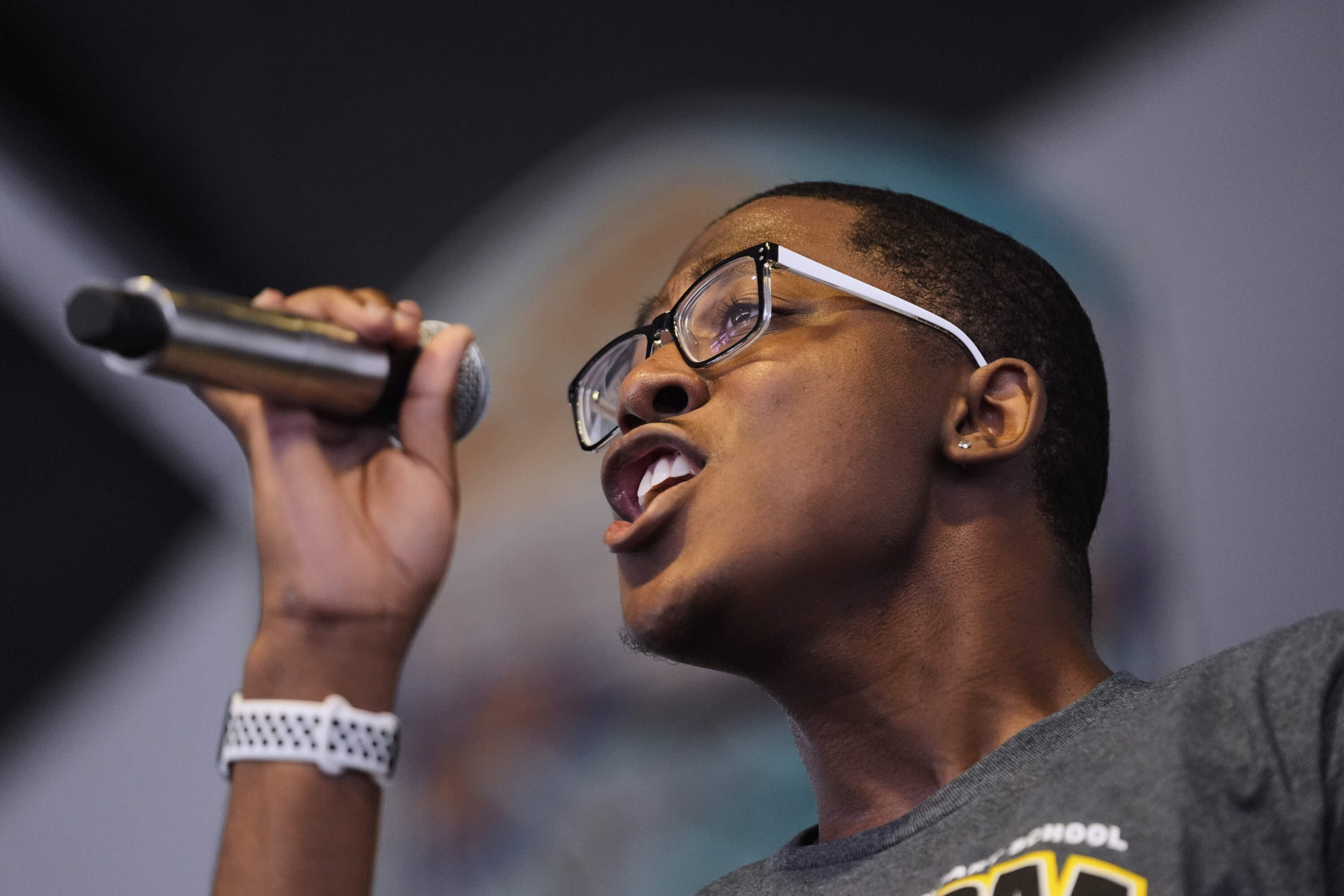 Tyree Arso solos with the Eleanor McMain Secondary School Singing Mustangs gospel choir at the New Orleans Jazz & Heritage Festival in New Orleans, Friday, April 25, 2025. (Gerald Herbert/AP)