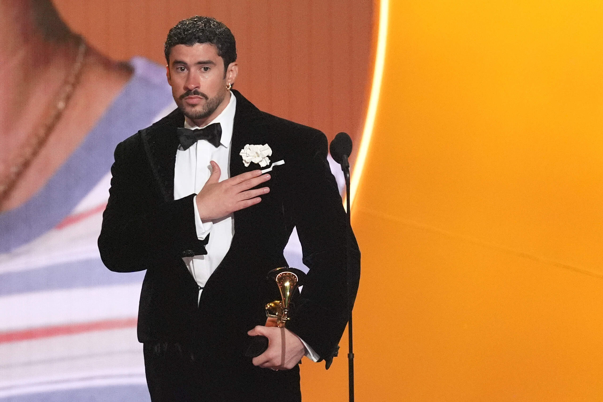 Bad Bunny accepts the award for album of the year for "Debí Tirar Más Fotos" during the 68th annual Grammy Awards on Sunday, Feb. 1, 2026, in Los Angeles. (Chris Pizzello/AP)