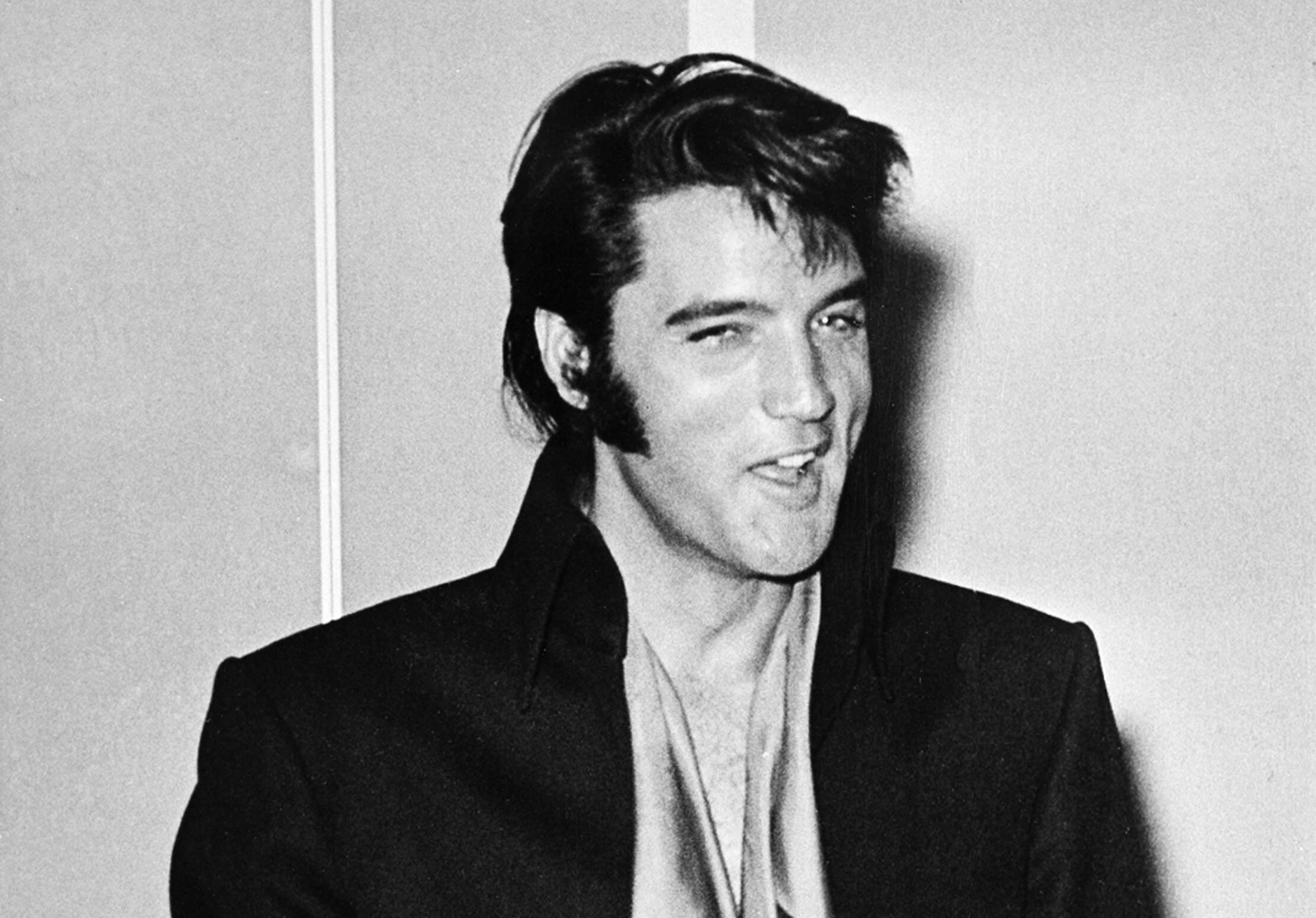 Elvis Presley is shown at the International Hotel where he made his first public stage appearance in 9 years in Las Vegas, Nev., in Aug. 1969. (AP Photo)