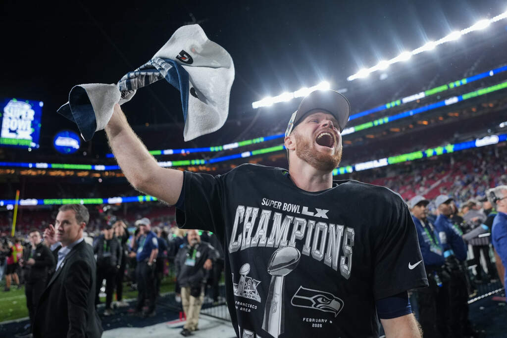 Seattle Seahawks quarterback Sam Darnold celebrates after a win over the New England Patriots in Super Bowl 60. (Matt Slocum/AP)