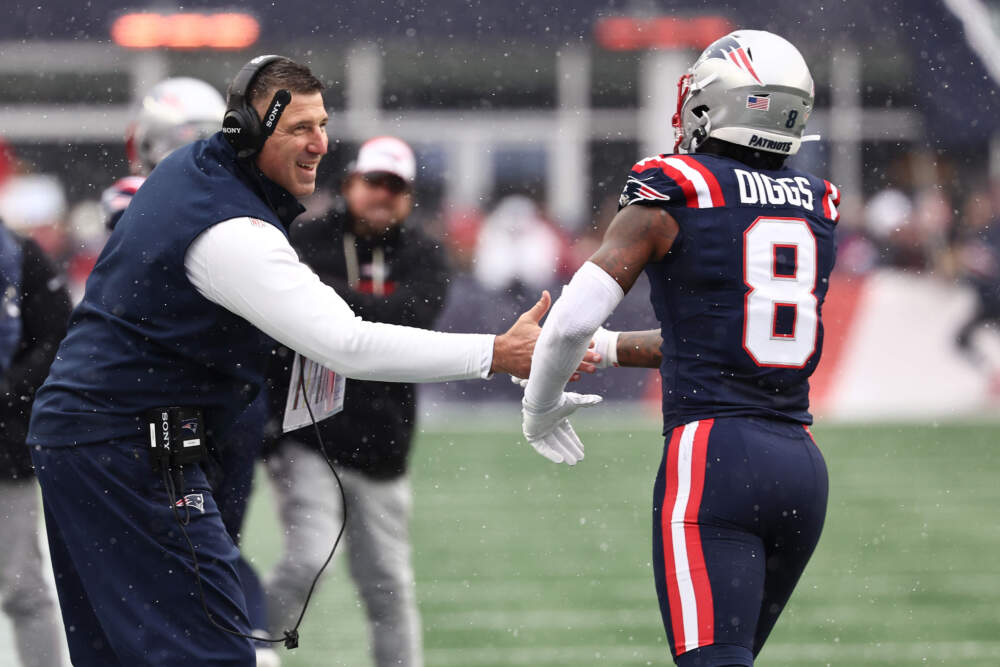 New England Patriots head coach Mike Vrabel congratulates wide receiver Stefon Diggs after a touchdown against the Buffalo Bills, Dec. 14, 2025 in Foxborough, Mass. (Winslow Townson/AP Images for Panini)