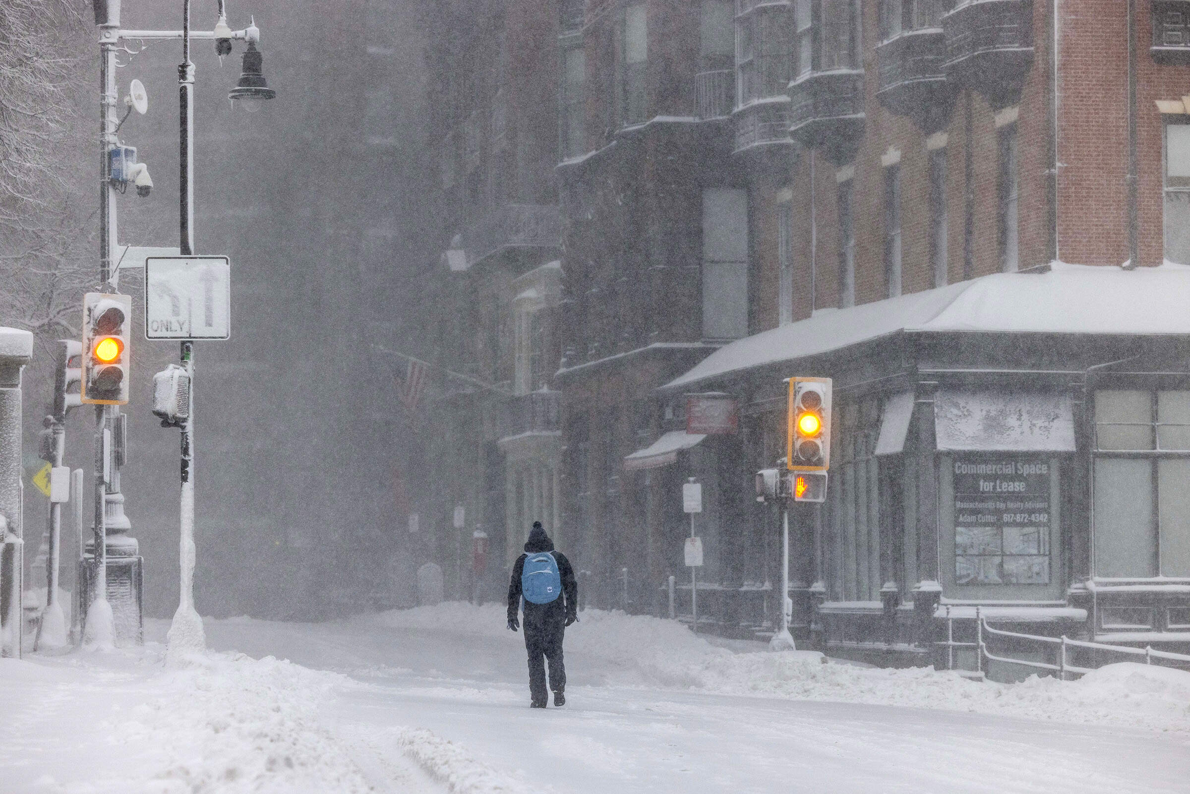 A person walks down Beacon Street on Monday in Boston. (Scott Eisen/Getty Images)