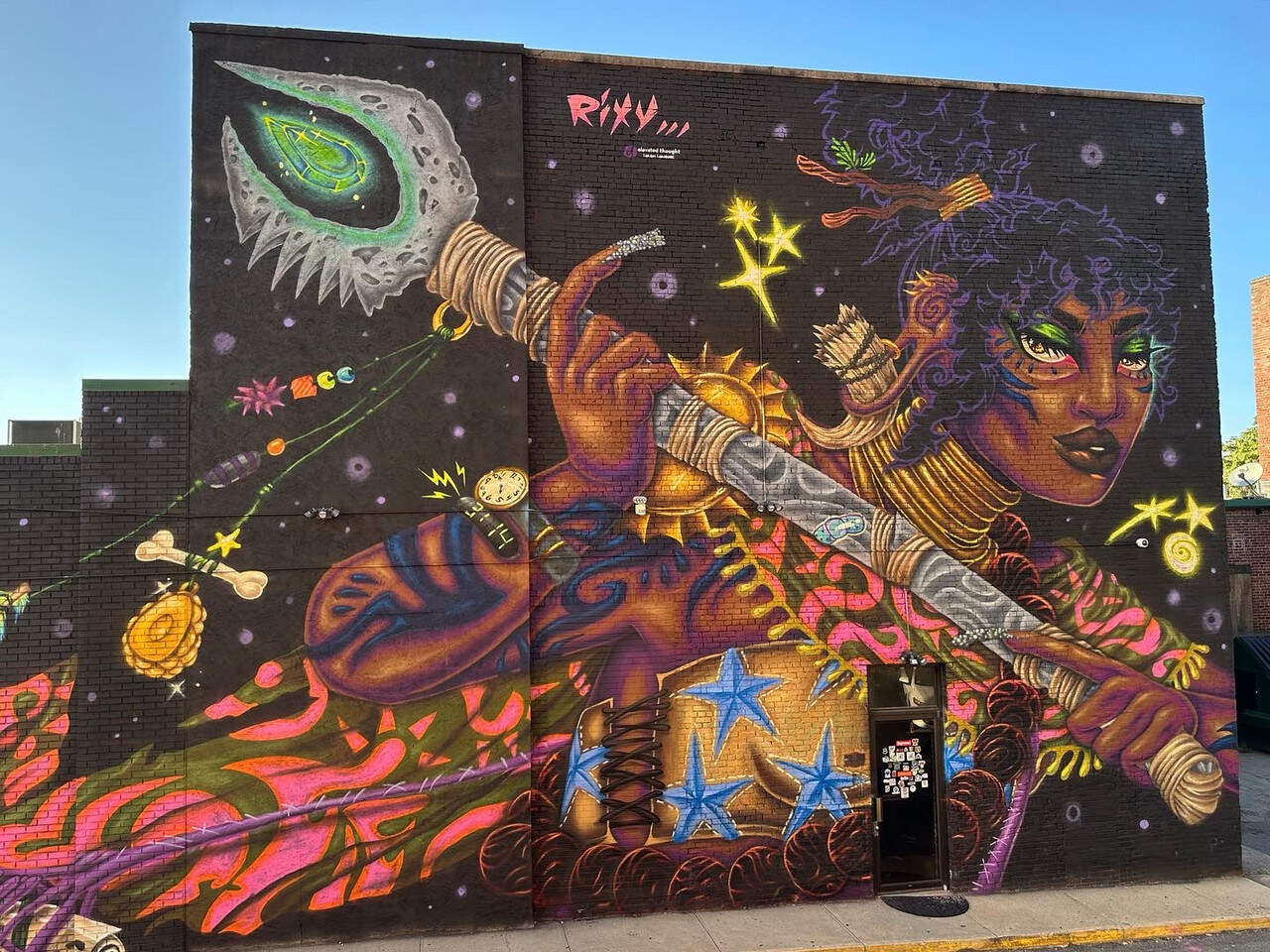 “Gitana The Twilight Traveler,” a 2023 public mural by Rixy, is displayed in Lawrence,MA. (Courtesy of the Greenway Conservancy and Rixy)