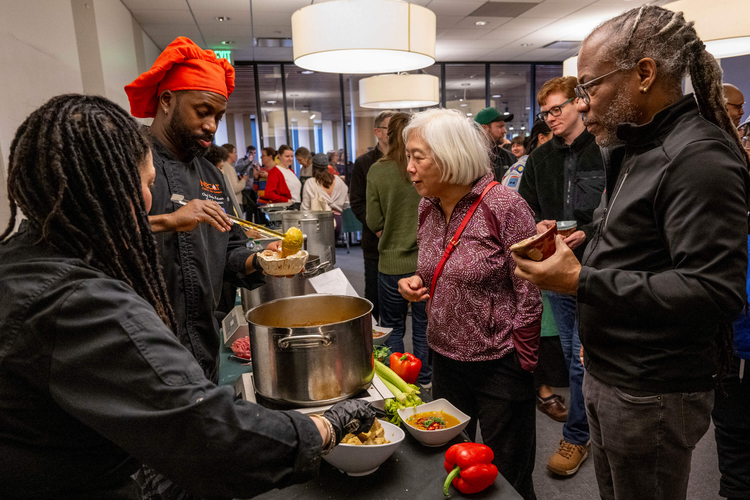 Chris Faison, director of culinary arts at New England Culinary Arts Training, serves a bowl of soup at the 2025 Souper Bowl. (Courtesy Melissa Ostrow)