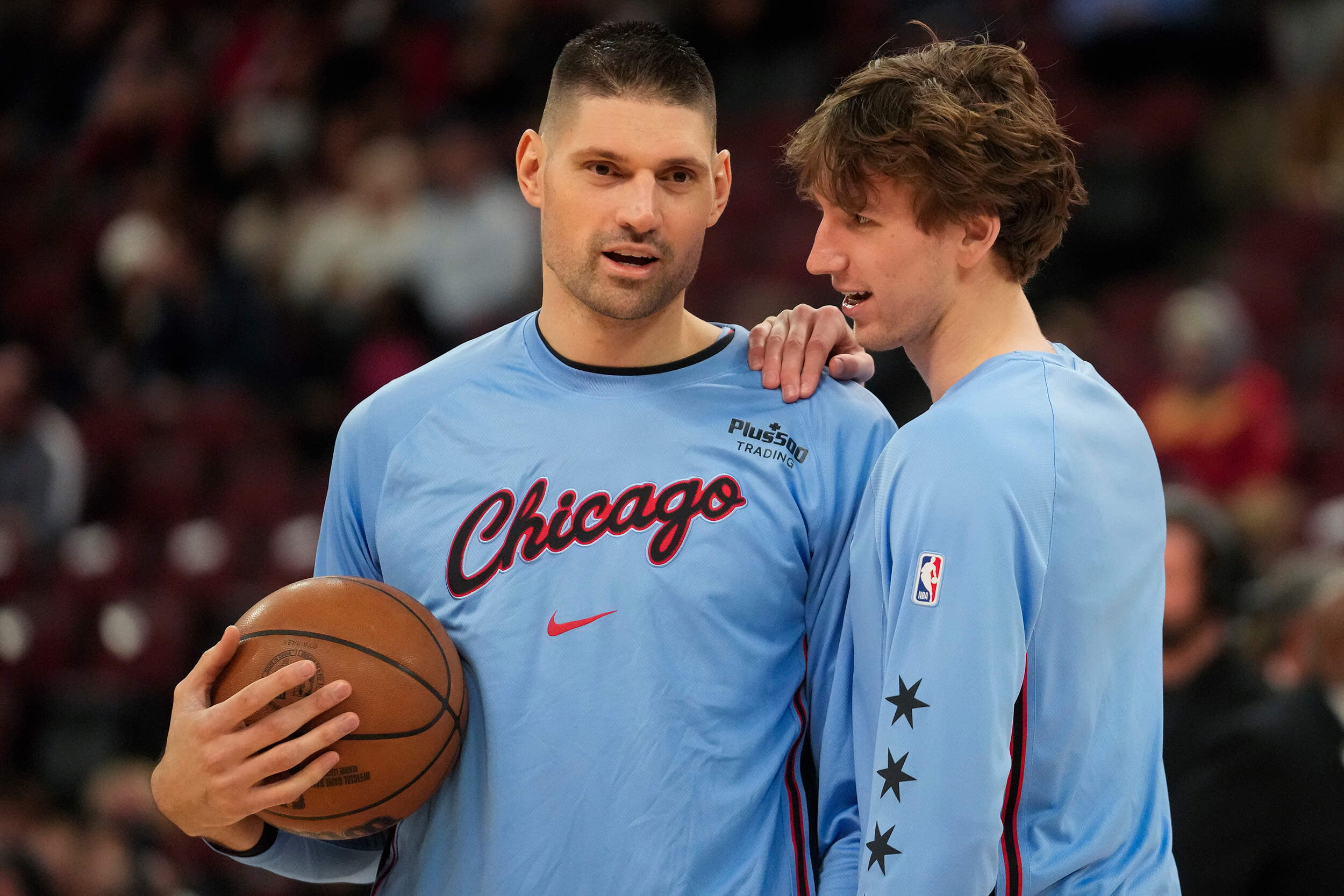 Chicago Bulls center Nikola Vucevic, left, warms up before game against the Miami Heat, Thursday, Jan. 29, 2026, in Chicago. (Erin Hooley/AP)