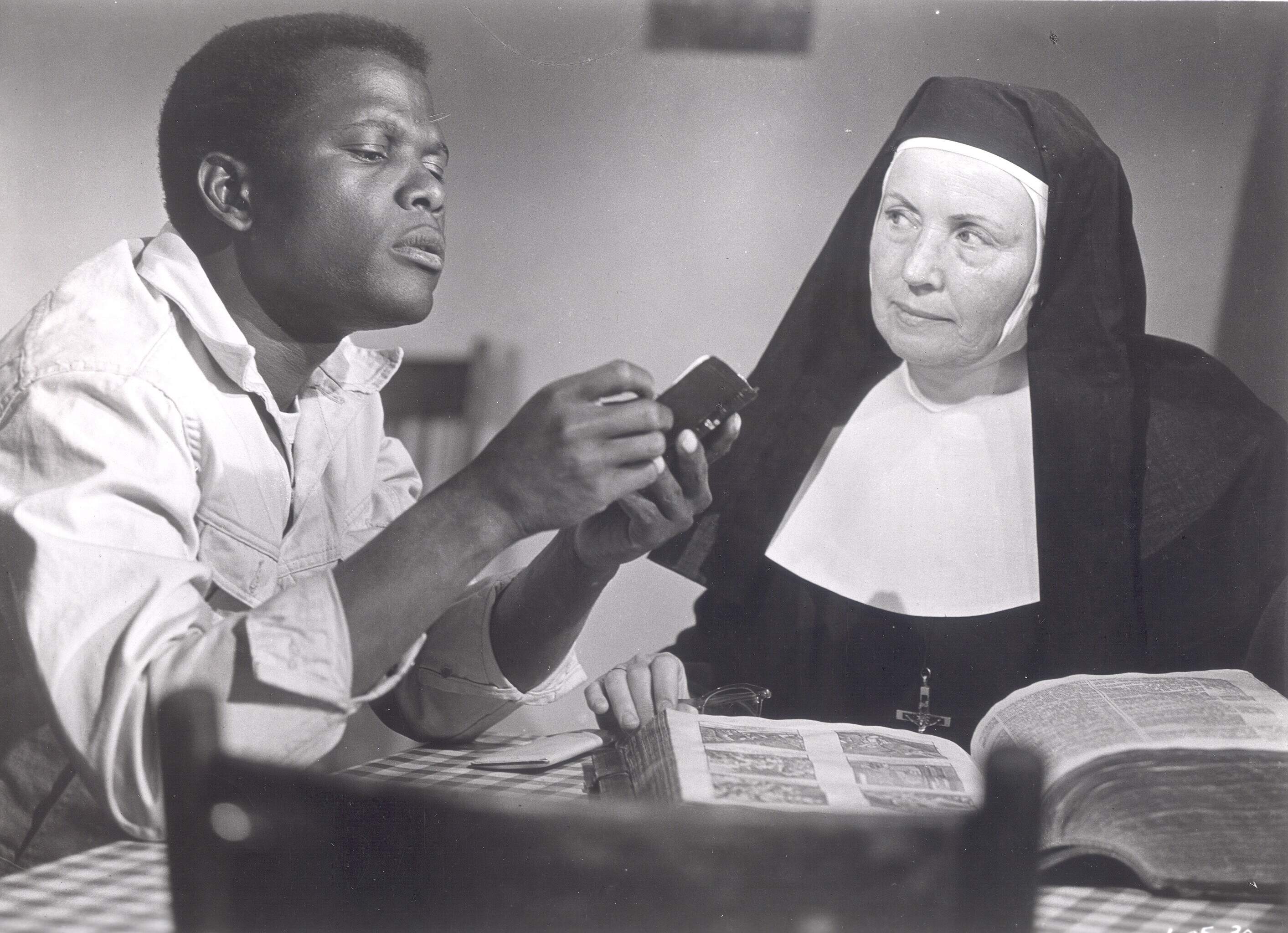 Sidney Poitier (left) and Lilia Skala in "Lilies of the Field." (Courtesy United Artists/Photofest)