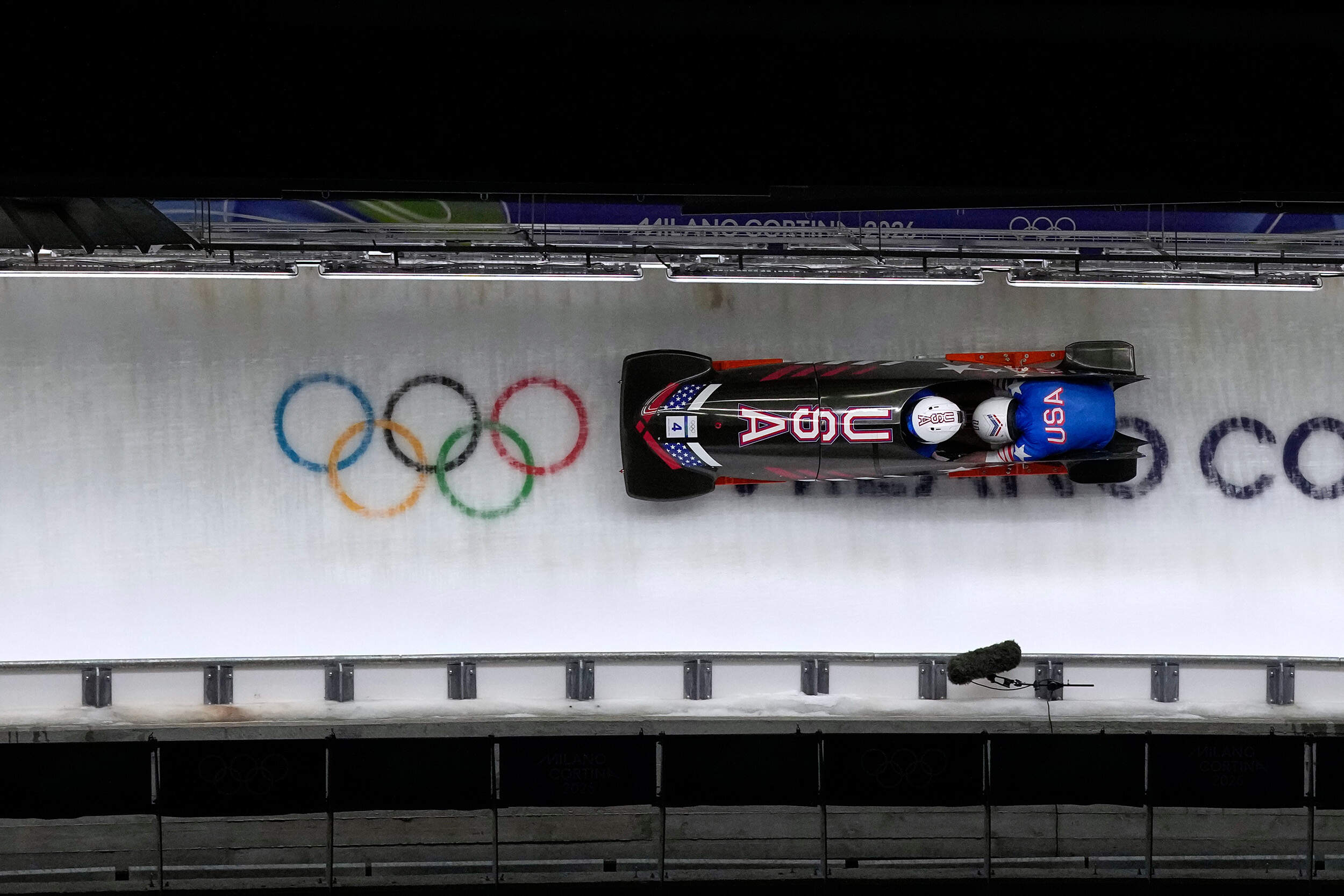 United States' Frank Del Duca and Joshua Williamson slide down the track during a two man bobsled run at the 2026 Winter Olympics, in Cortina d'Ampezzo, Italy, Tuesday, Feb. 17, 2026. (Alessandra Tarantino/AP)