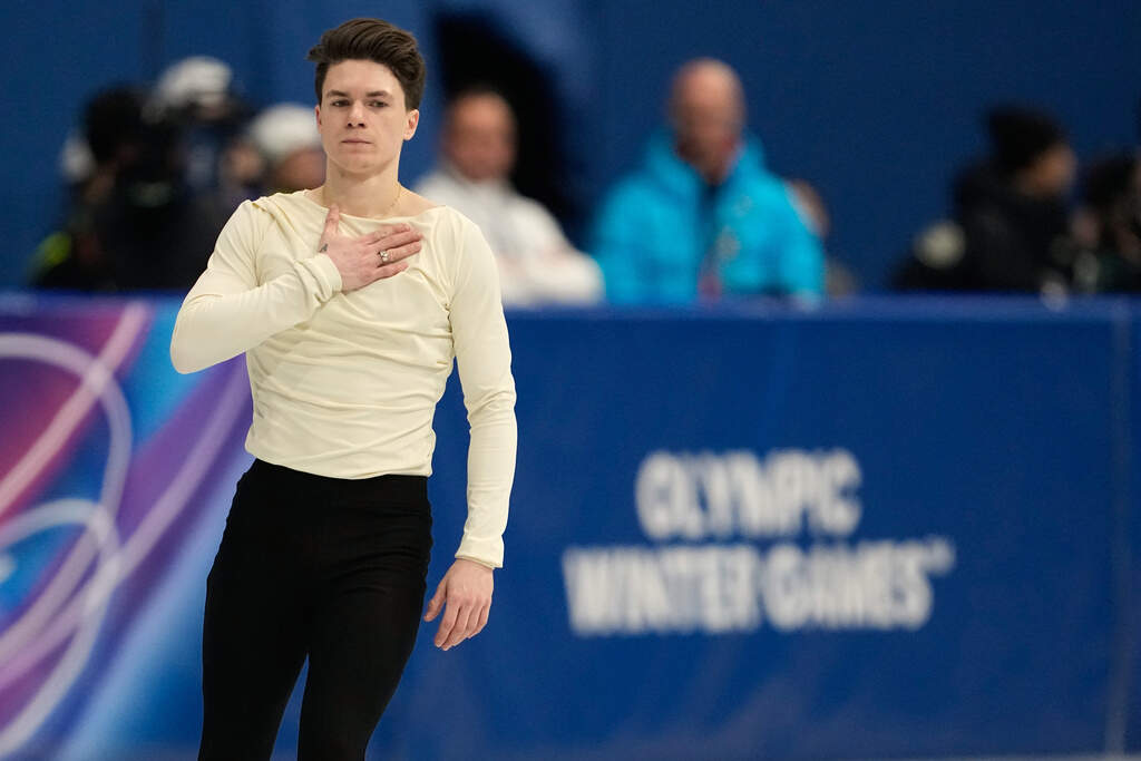 Maxim Naumov of the United States competes during the men's figure skating short program at the 2026 Winter Olympics, in Milan, Italy, Tuesday, Feb. 10, 2026. (Ashley Landis/AP)