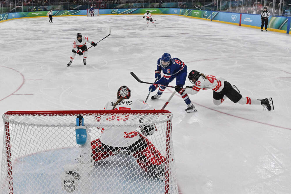 United States' Megan Keller (5) scores the winning goal during the gold medal game between the United States and Canada. (Alexander Nemenov/Pool Photo via AP)
