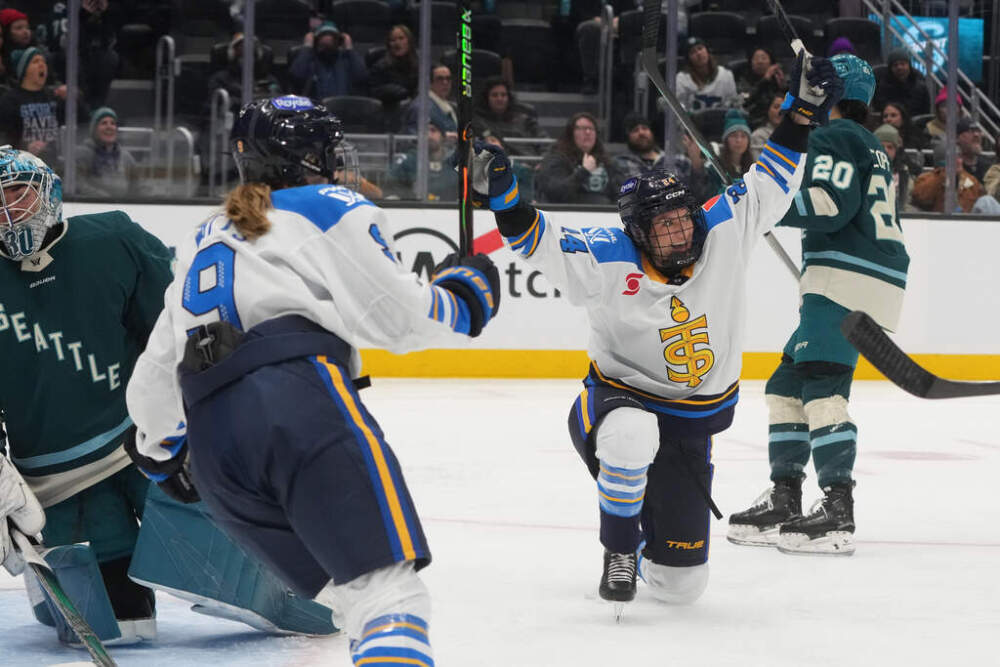 Toronto Sceptres forward Natalie Spooner celebrates a goal against Seattle Torrent goaltender Corinne Schroeder, left, during the third period of a PWHL hockey game, Tuesday, Jan. 20, 2026, in Seattle. (Lindsey Wasson/AP)