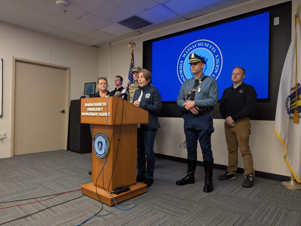Gov. Healey with other state officials at the MEMA bunker in Framingham on Monday. (Priyanka Dayal McCluskey/WBUR)