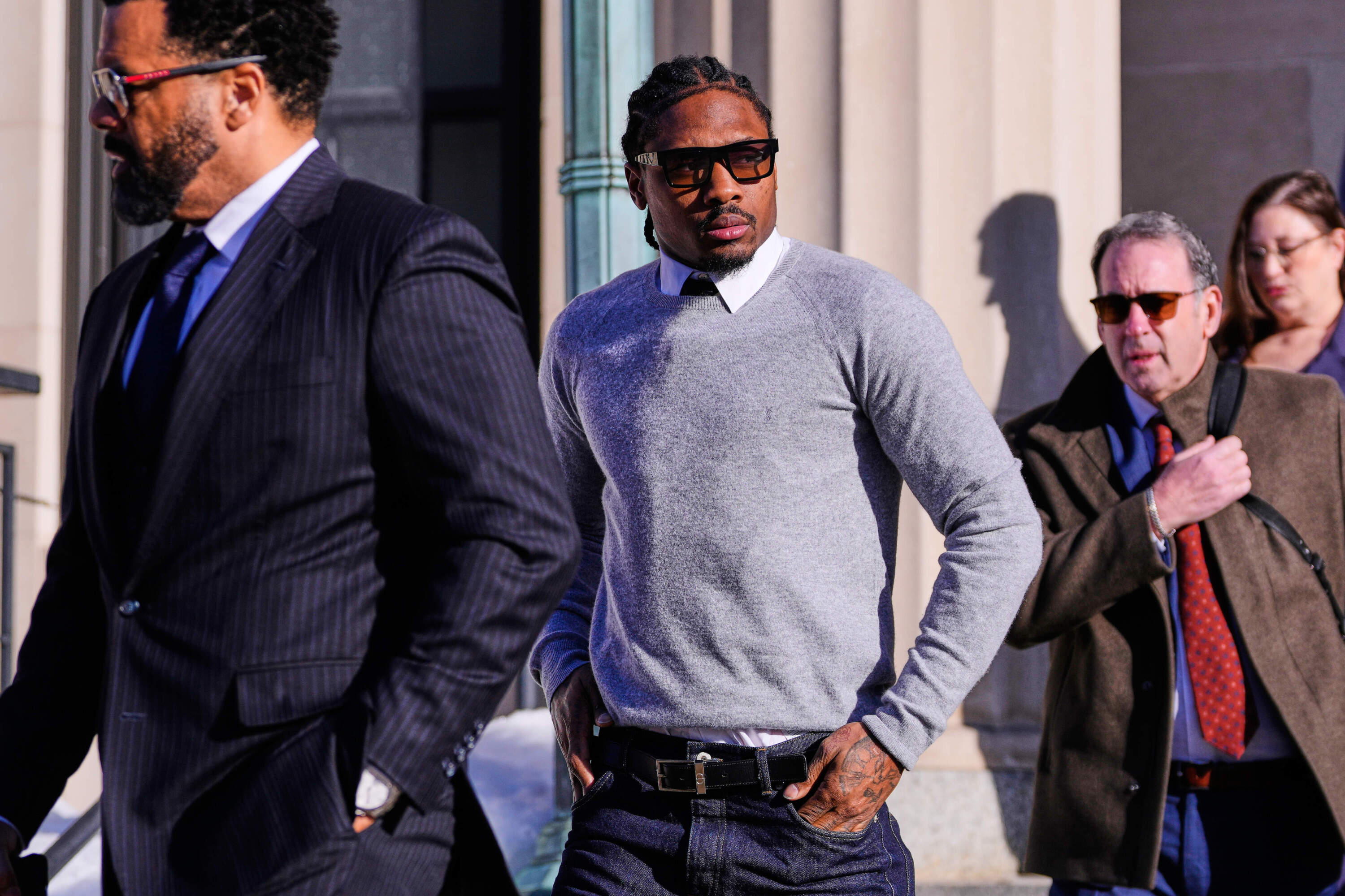 New England Patriots wide receiver Stefon Diggs leaves Norfolk County District Court after his arraignment Friday in Dedham. (Charles Krupa/AP)