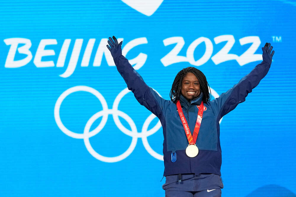 Gold Medalist Erin Jackson of the United States celebrates during the medal ceremony for the speedskating women's 500-meter race at the 2022 Winter Olympics, Monday, Feb. 14, 2022, in Beijing. (Sue Ogrocki/AP File)