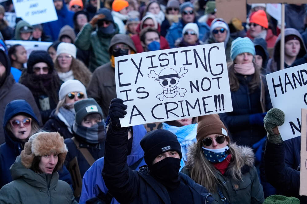 People protest against U.S. Immigrations and Customs enforcement in Portland, Maine on Jan. 30. (Robert F. Bukaty/AP)