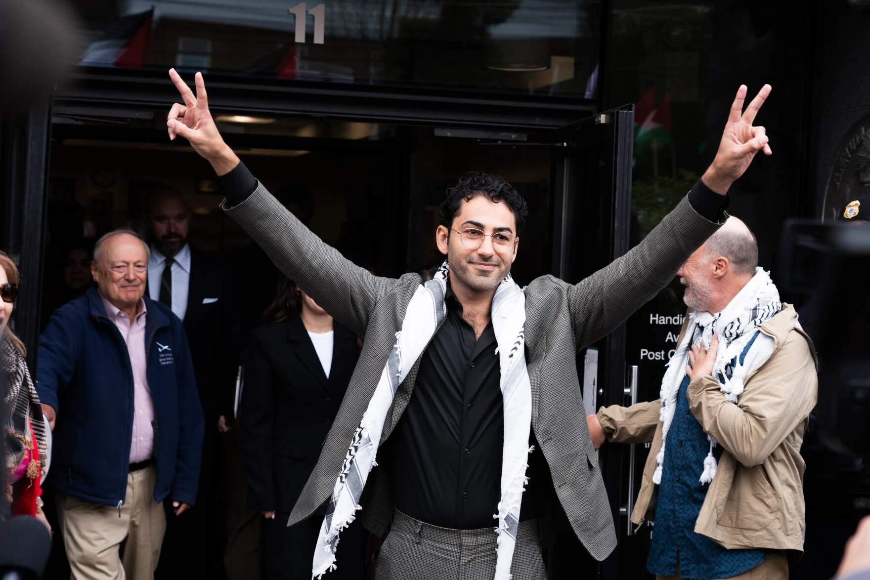 A federal immigration judge dismissed the deportation case against Mohsen Mahdawi on Friday, Feb. 13. Mahdawi is seen here in April 2025 greeting supporters after a judge ordered his release from detention. (Joey Palumbo/Vermont Public)