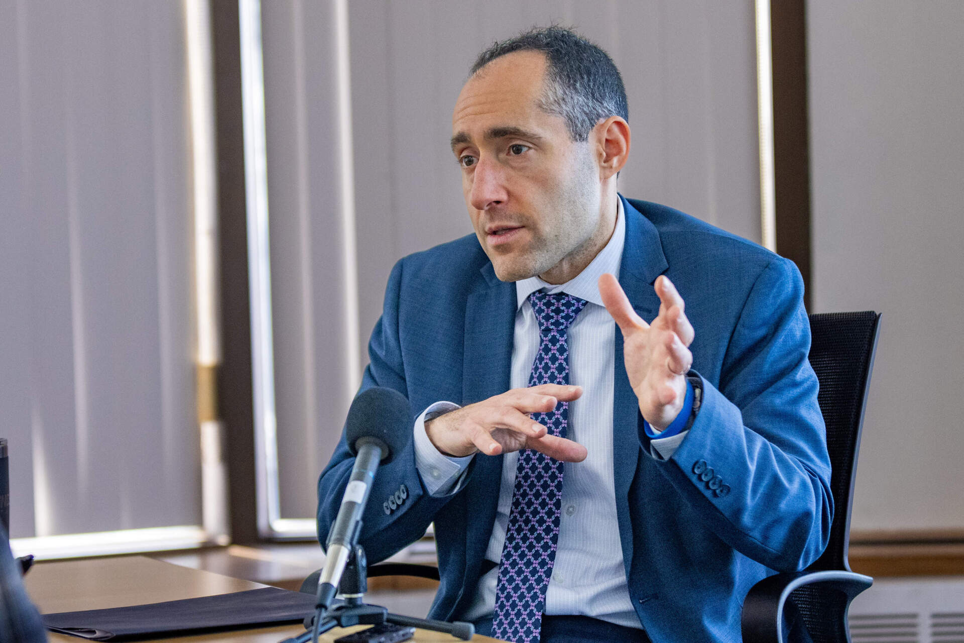 Massachusetts Secretary of the Executive Office of Economic Development Eric Paley speaking during an interview with WBUR. (Jesse Costa/WBUR)