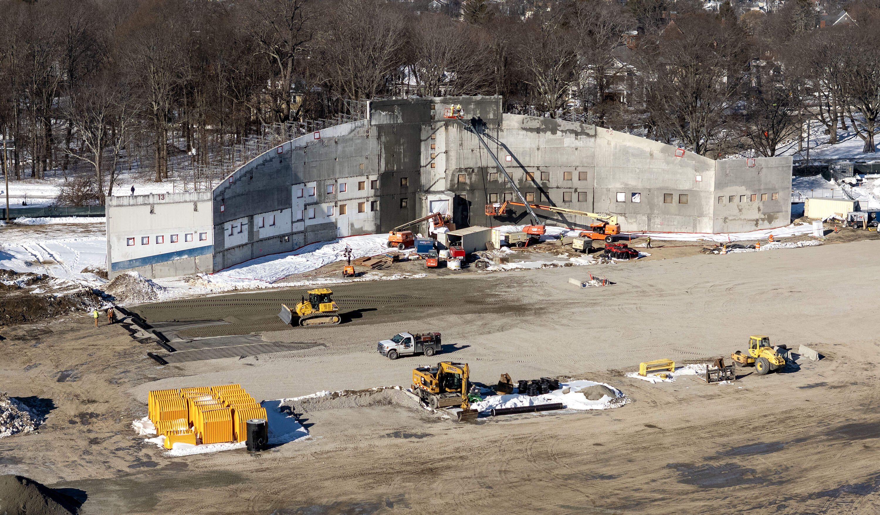 One of the original White Stadium walls remains as a feature of the new stadium under construction in Franklin Park, Boston, Feb. 5, 2026. (Robin Lubbock/WBUR)