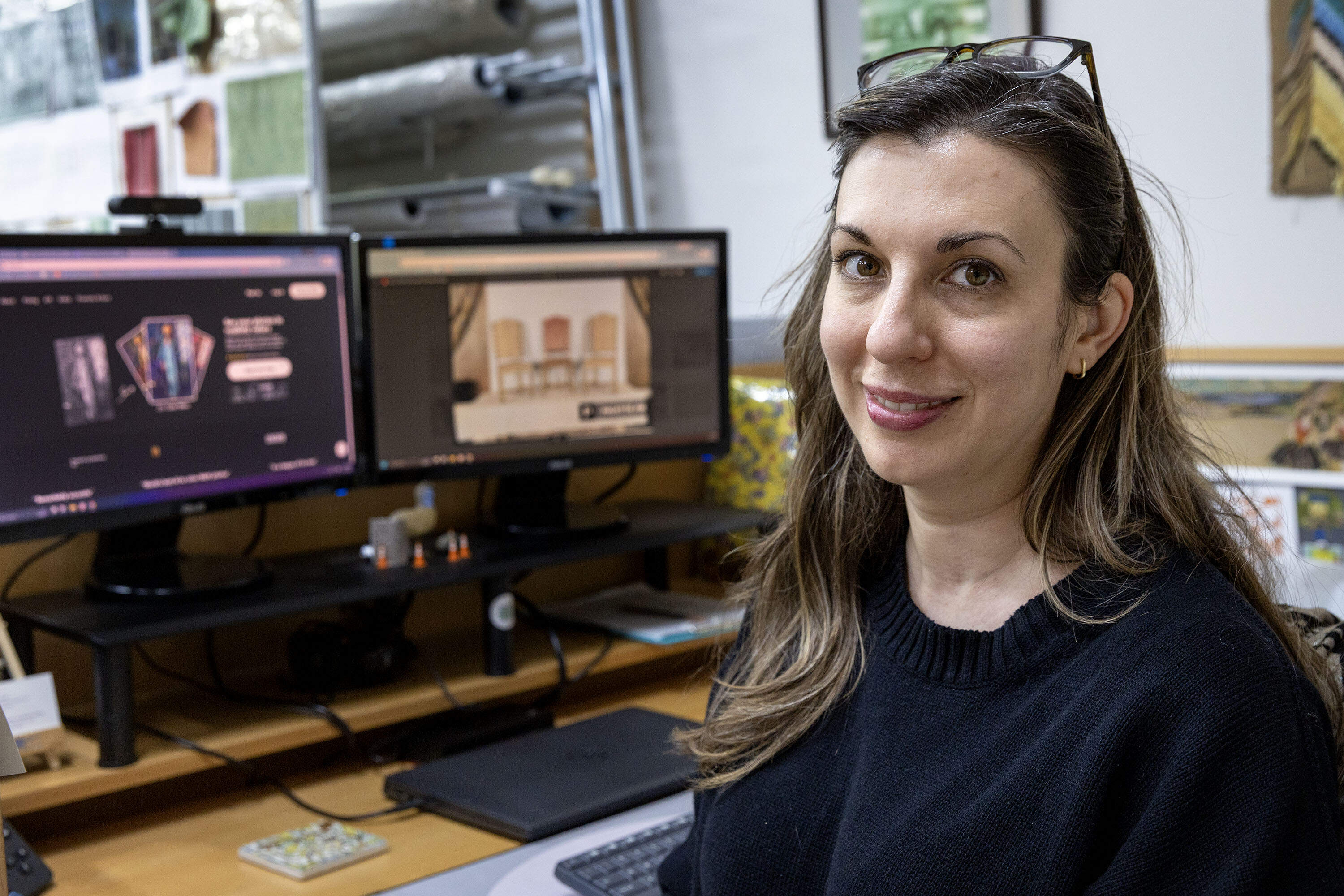 Kathleen King, registrar at the Isabella Stewart Gardner Museum, at her desk the museum's restoration workshop. (Robin Lubbock/WBUR)