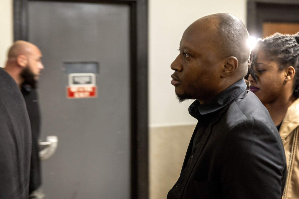 Former bus driver Jean Charles arrives at his arraignment in Suffolk Superior Court. (Robin Lubbock/WBUR)