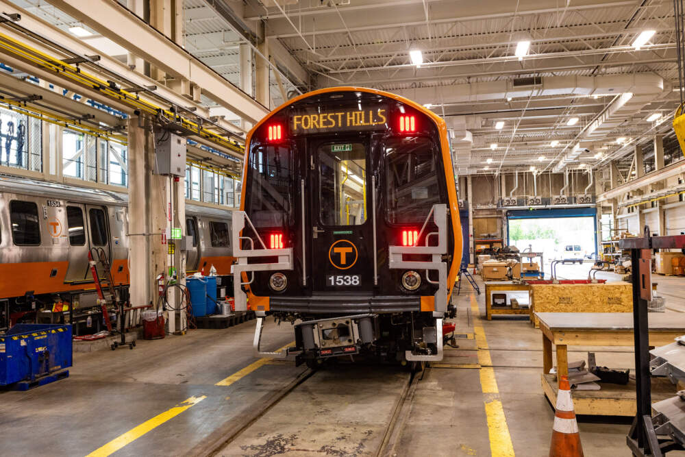 A brand-new Orange Line car is tested at the Wellington Train Yard in Medford in 2025. (Jesse Costa/WBUR)