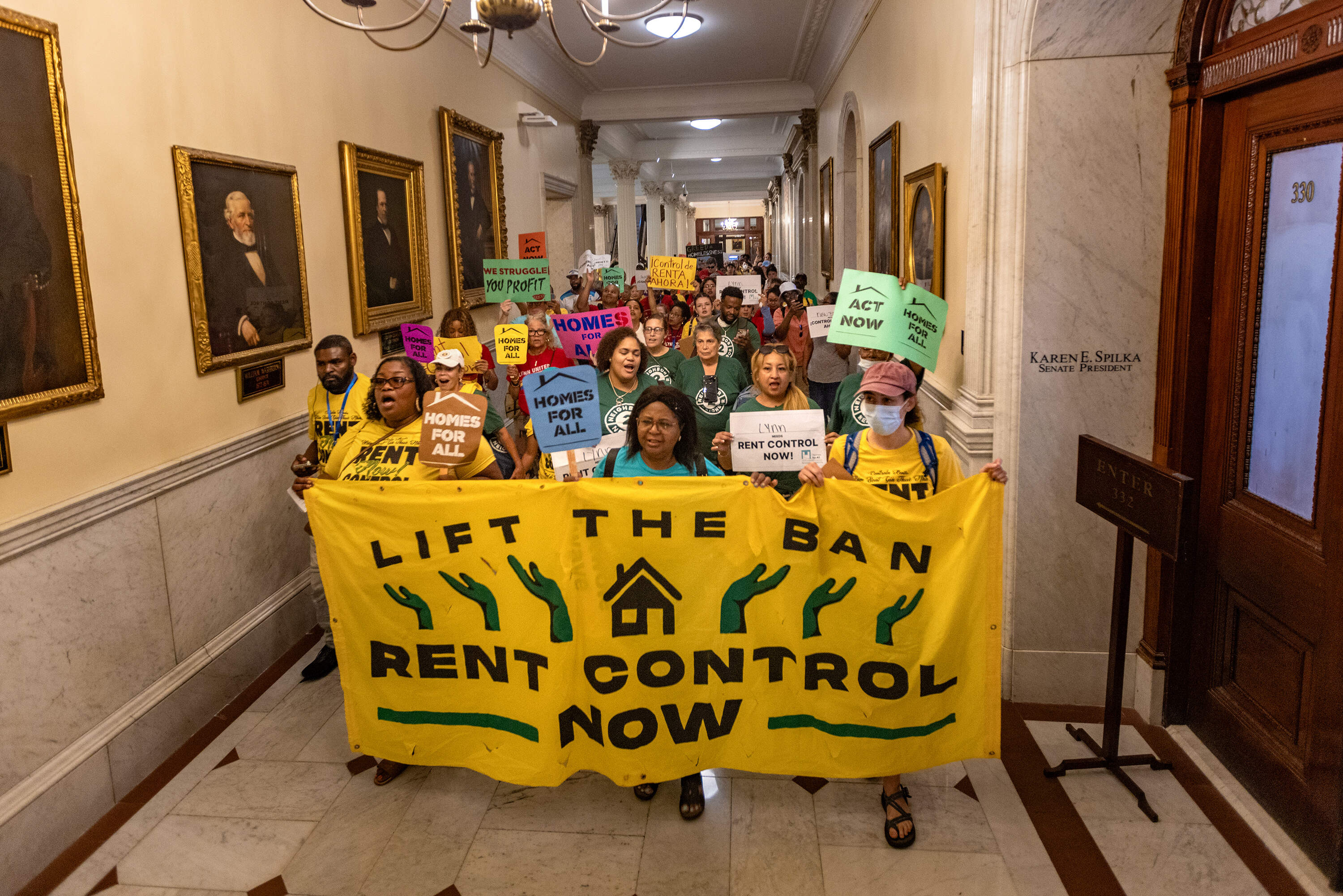 Rent control supporters during a protest at the Massachusetts State House last summer.