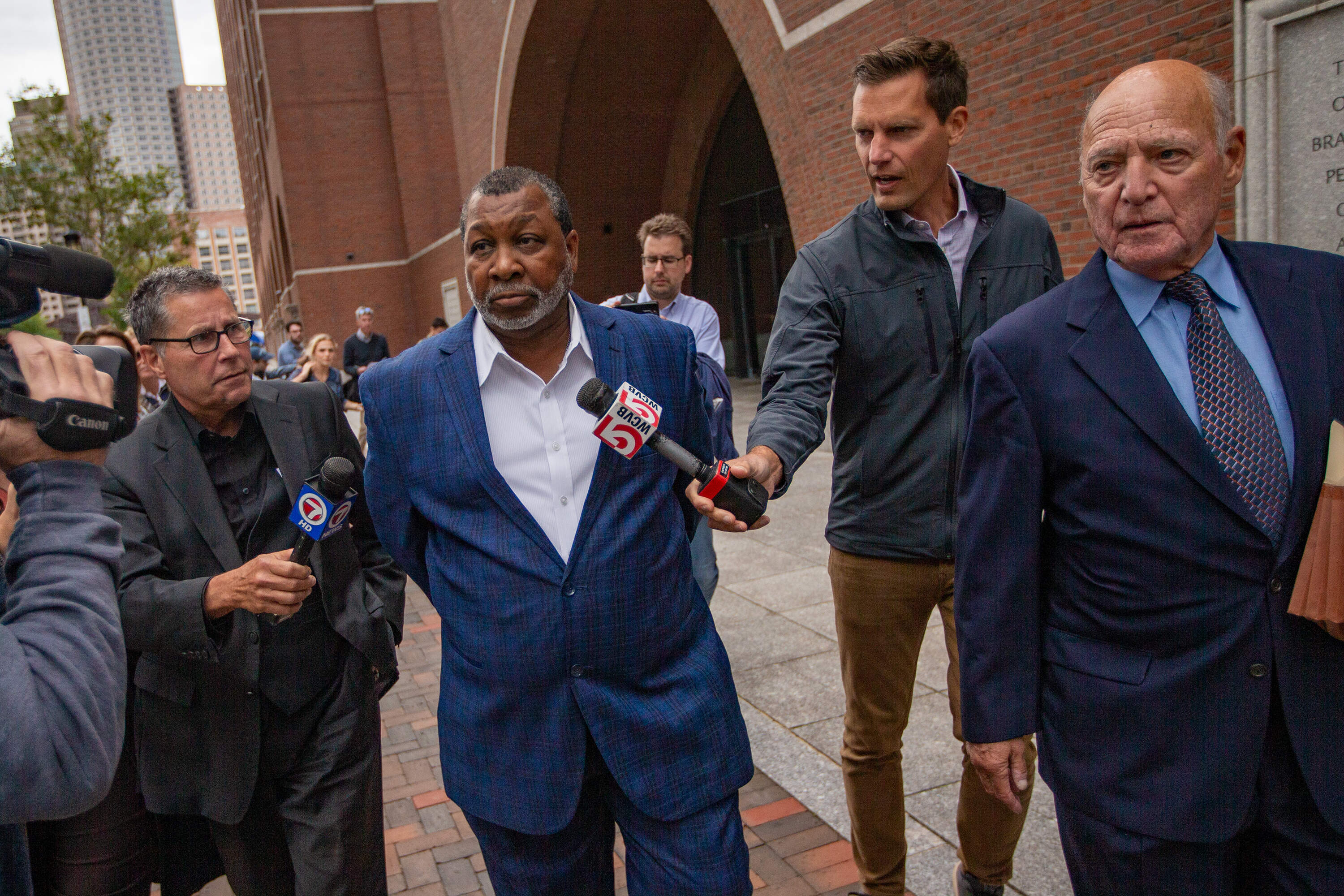 Suffolk County Sheriff Steven Tompkins leaves the Moakley Federal Courthouse in August 2025. (Jesse Costa/WBUR)
