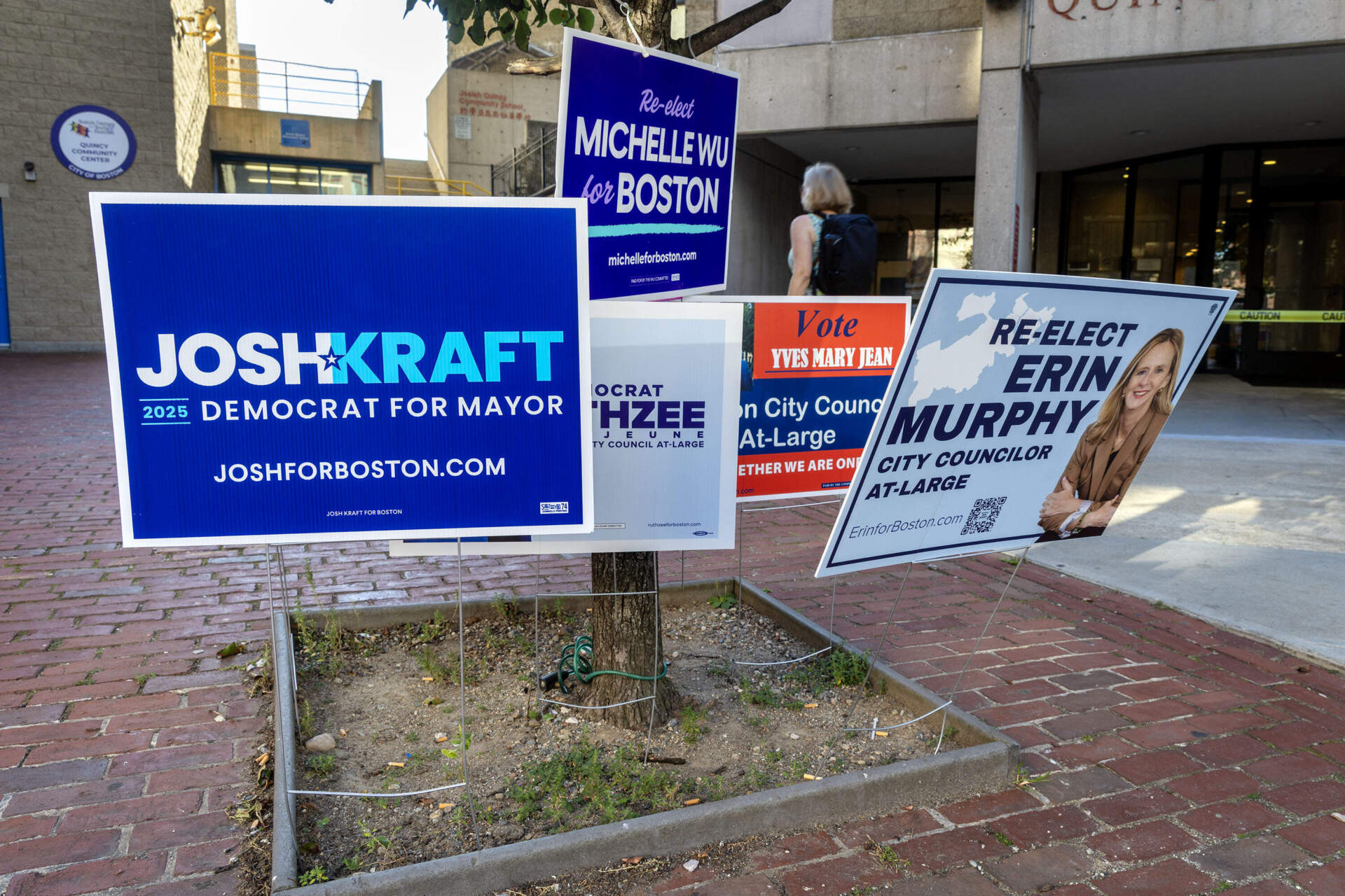 Campaign signs during Boston's municipal election in 2025 in the Chinatown neighborhood of Boston. (Robin Lubbock/WBUR file)
