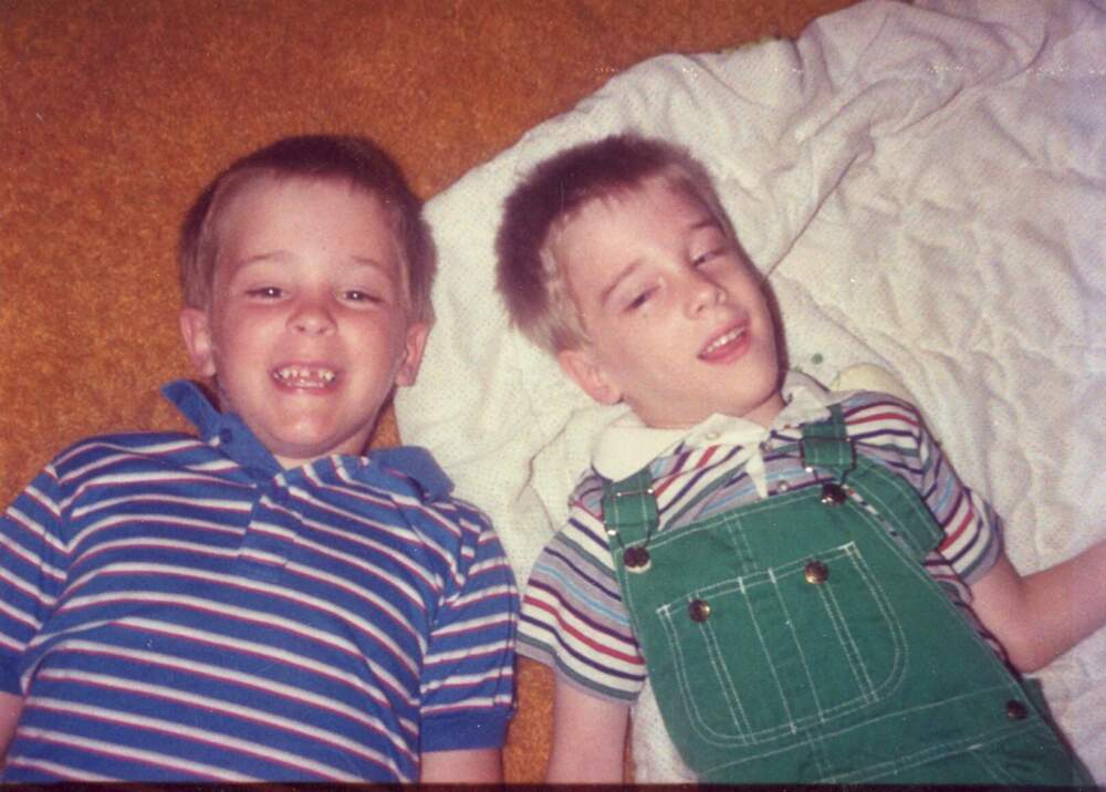 The author and his brother, age 7, play on the floor of the living room floor of their home in Catonsville, Md., in 1990. (Courtesy Brian Trapp)