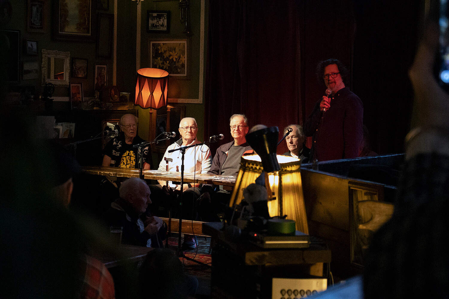 (L-R) Norm Roth, Clayton Milne, Wayne Harbord, Craig Abbott, members of the rock band The Glass Cage, with retired music promoter Marcus Pollard. (Courtesy of Lauryn Mackenzie/CHLY 101.7FM)