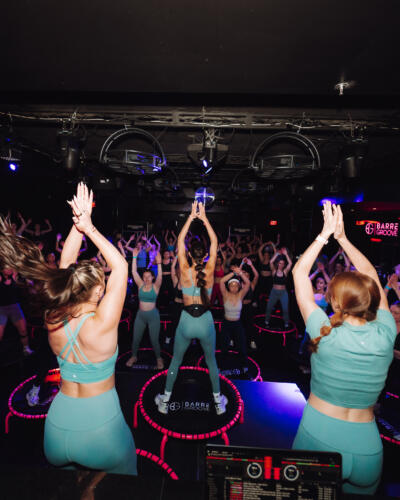 Barre Groove owner Alanna Perry, center, teaches her signature trampoline "twerkout" workout at Bijou nightclub. (Courtesy Alyssa Pascucci)