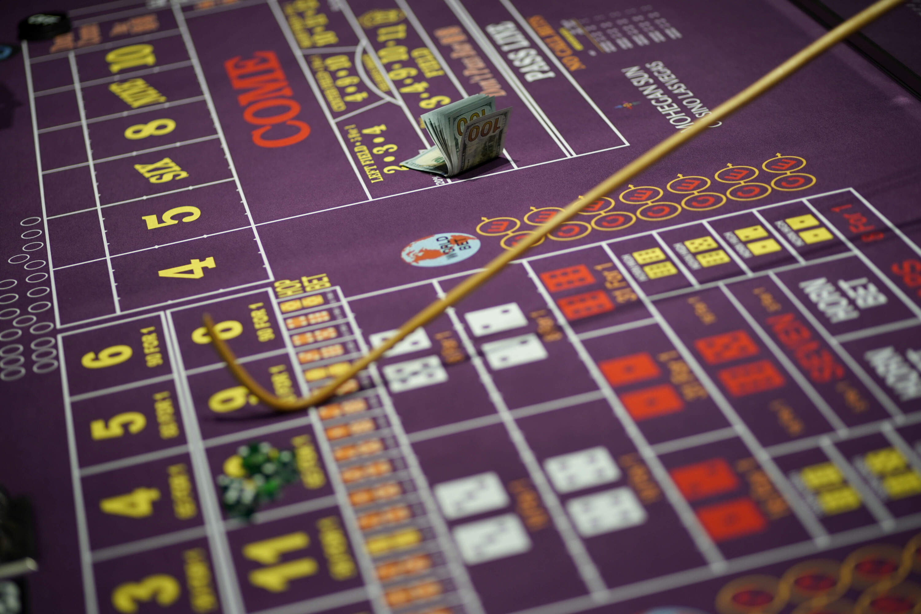 A stack of hundred-dollar bills sits on a craps table in the casino on the opening night of the Mohegan Sun Casino at Virgin Hotels Las Vegas, Thursday, March 25, 2021, in Las Vegas. (John Locher/AP)