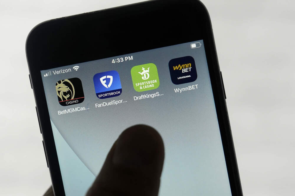 FanDuel, DraftKings and other online gambling apps are displayed on a phone in San Francisco, Sept. 26, 2022. (Jeff Chiu/AP)