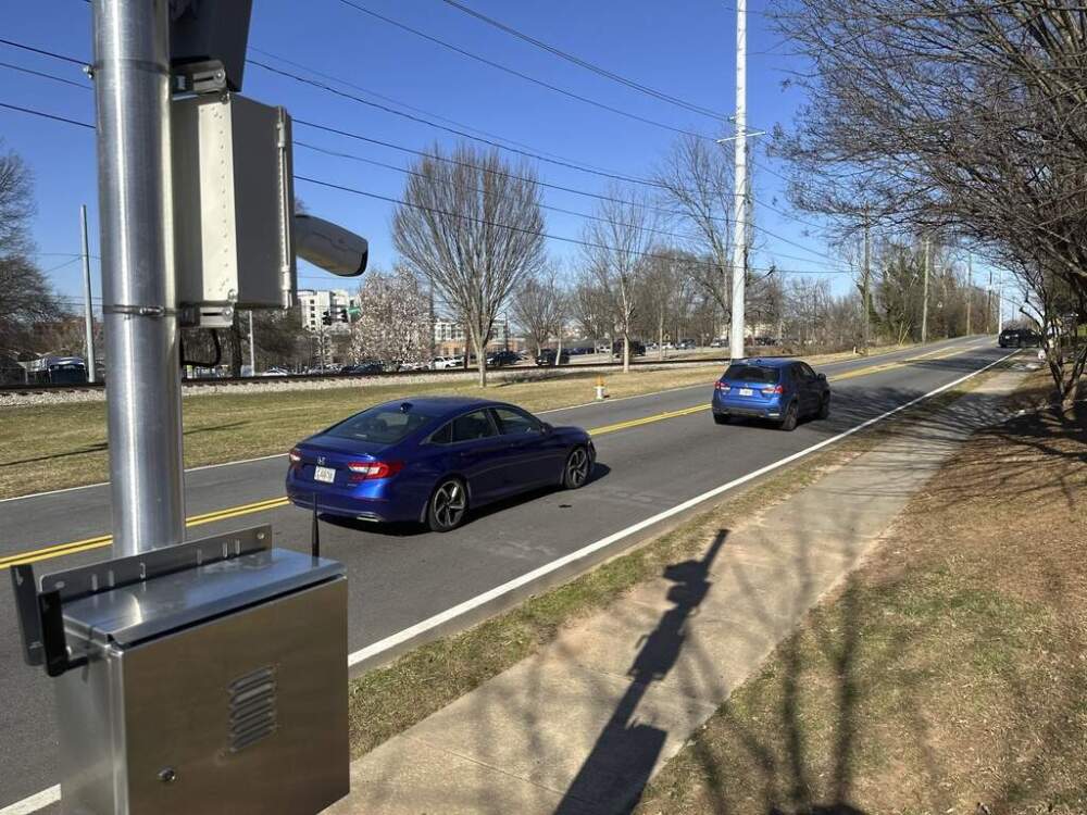 Traffic passes an automated speed camera outside Beacon Hill Middle School in Decatur, Ga., on Tuesday, Feb. 25, 2025. (Jeff Amy/ AP)