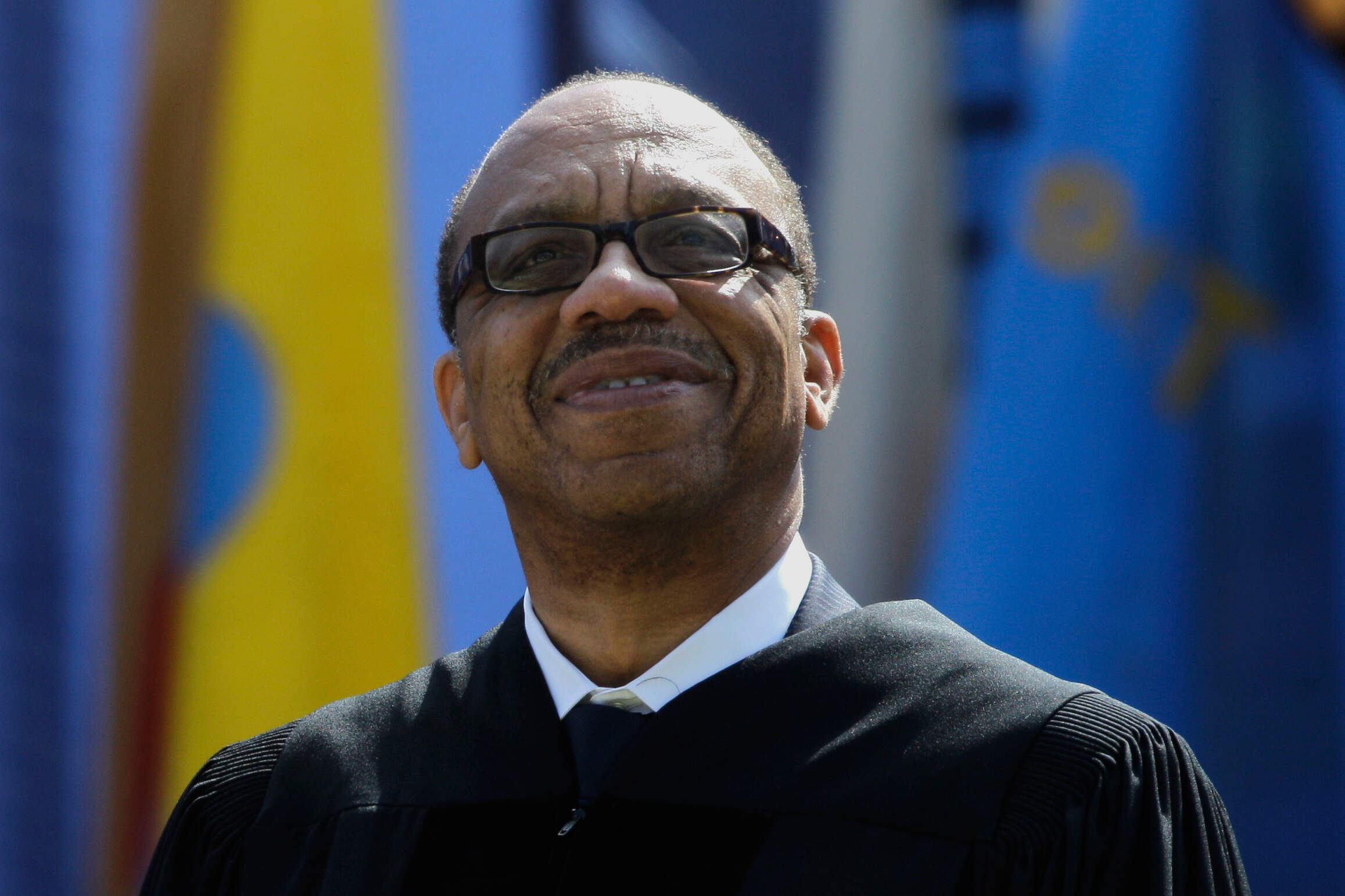 Eugene Robinson, Pulitzer Prize-winning journalist and author, smiles while receiving the honorary Doctor of Humane Letters at the University of Michigan commencement at Michigan Stadium in Ann Arbor, Mich., Saturday, April 30, 2011. (Paul Sancya/AP)