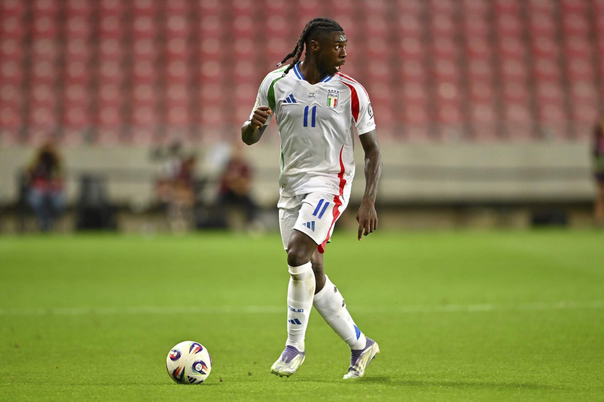 Italy's Moise Kean controls the ball during a World Cup qualifier match in 2025. (Denes Erdos/AP)