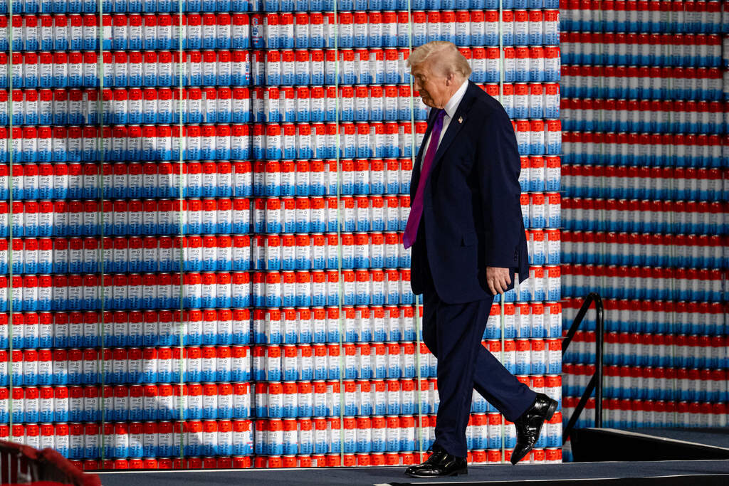 President Donald Trump arrives to speak at Verst Logistics Wednesday, March 11, 2026, in Hebron, Ky. (AP Photo/Jon Cherry)