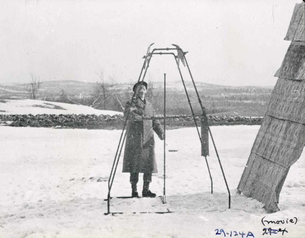 Robert Goddard looks up after the first flight of a liquid-propelled rocket, March 16, 1926. (Courtesy of Clark University Archives and Special Collections)
