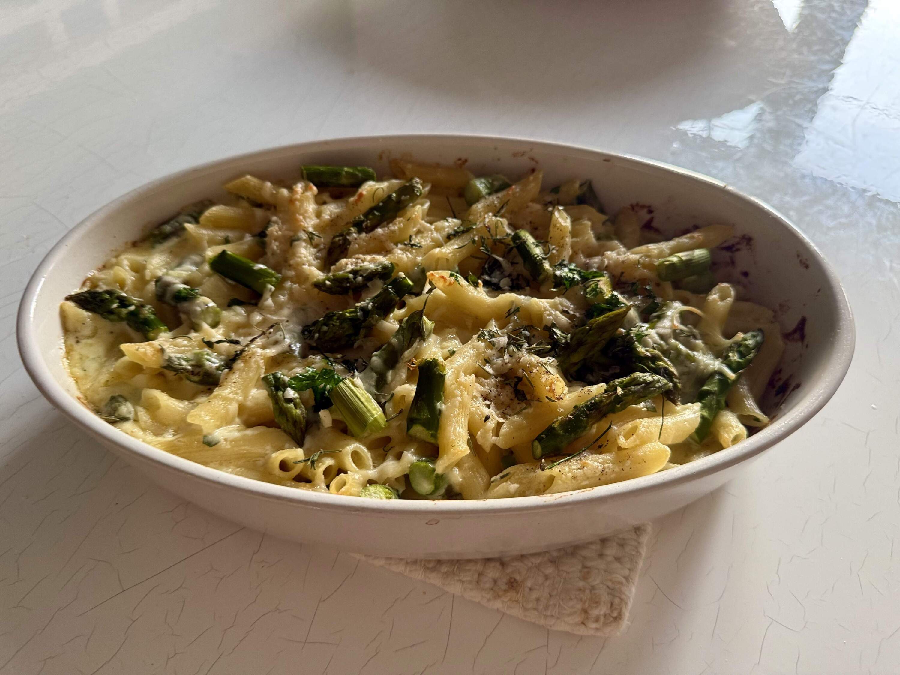 Spring mac and cheese with herbs and asparagus. (Kathy Gunst/Here & Now)