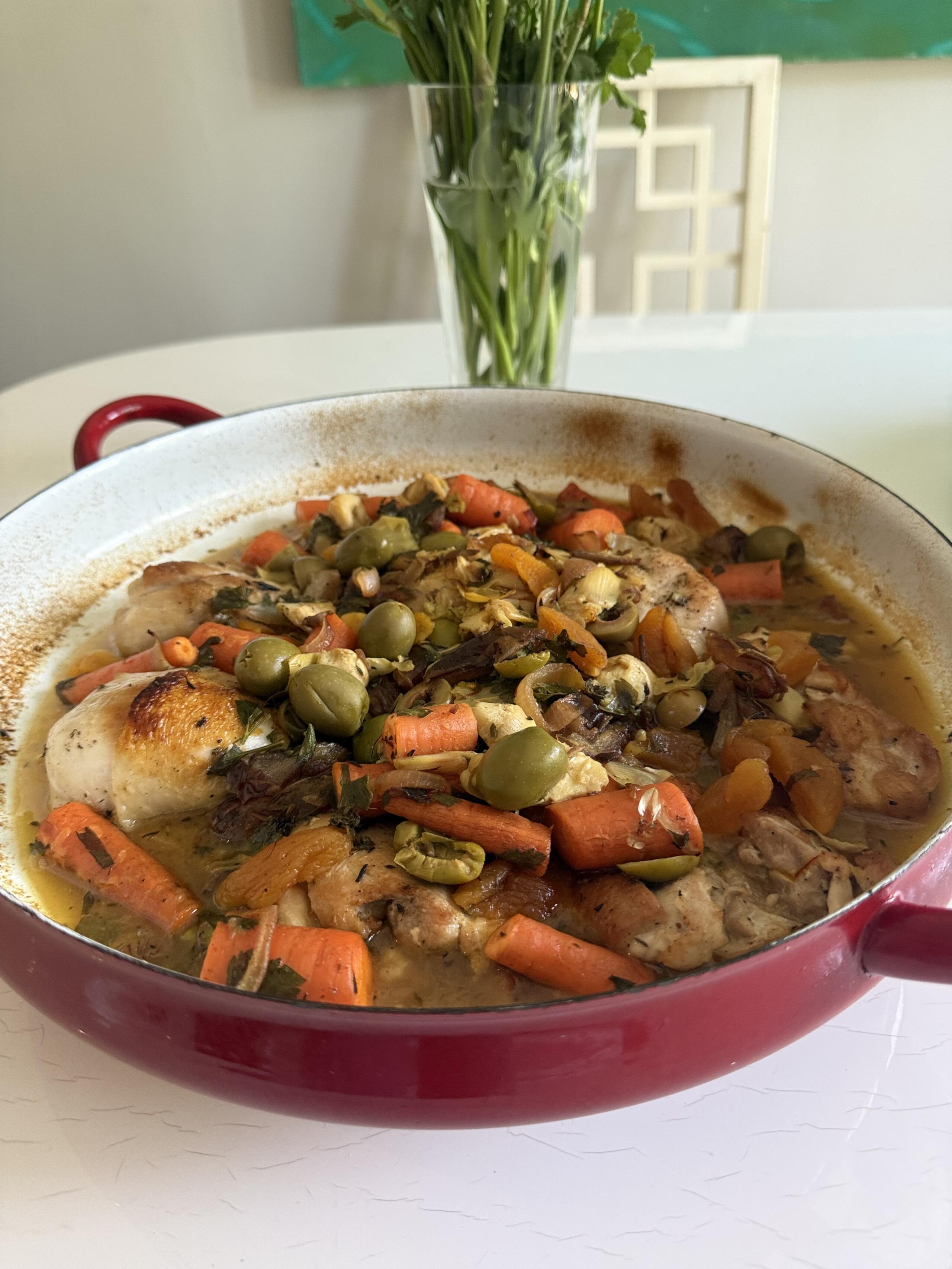 Braised chicken with apricots, green olives, carrots, artichoke hearts and dates. (Kathy Gunst/Here & Now)