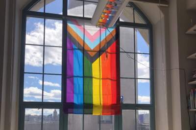 Following outcry, BU president defends removing pride flags