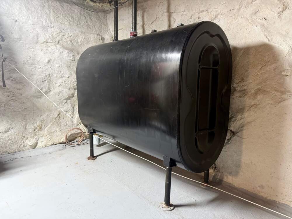 An oil tank in a Massachusetts home. (Miriam Wasser/WBUR)