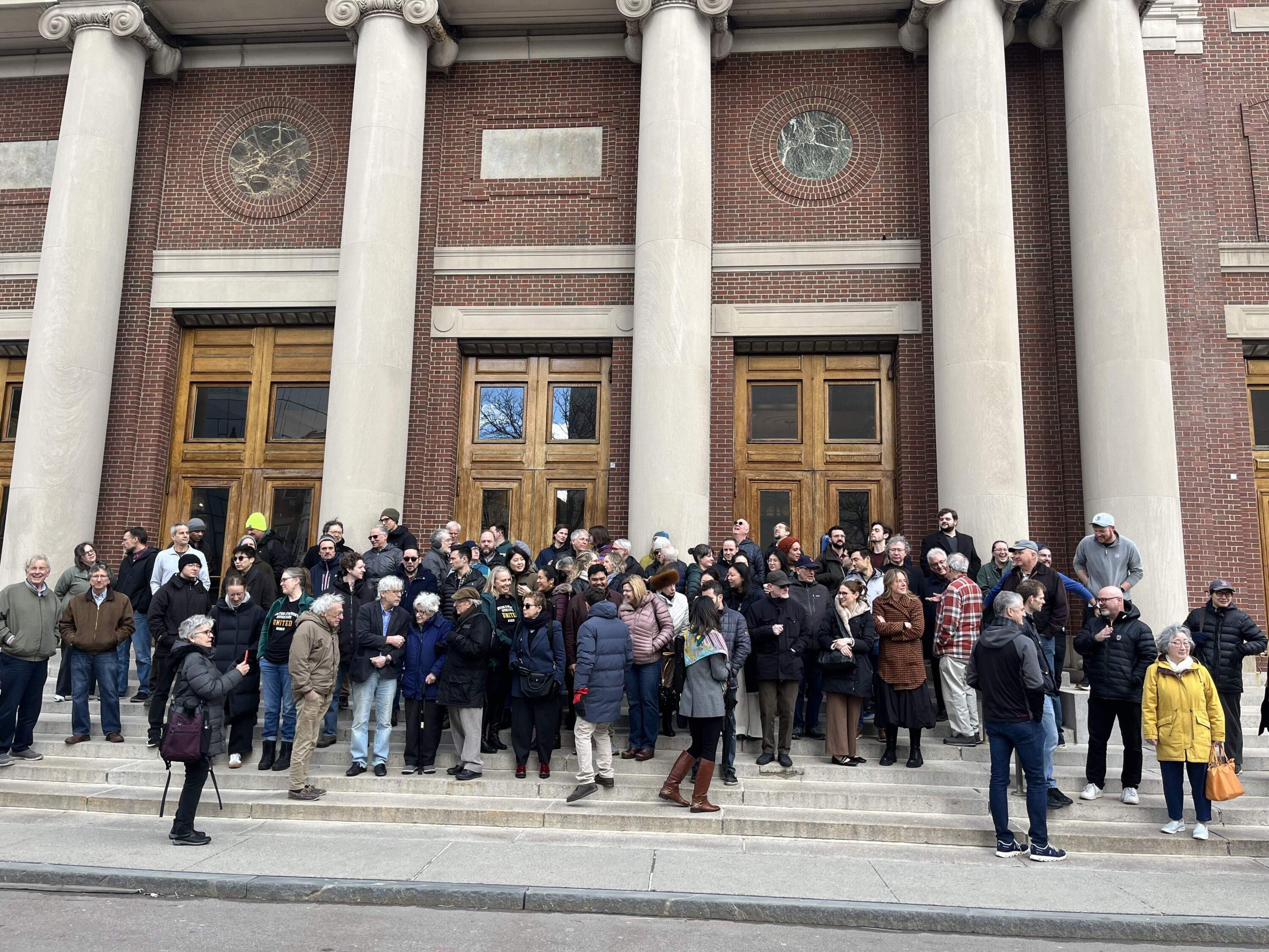 Nelsons' supporters wait for him to arrive Tuesday morning at Symphony Hall. (Amelia Mason/WBUR)