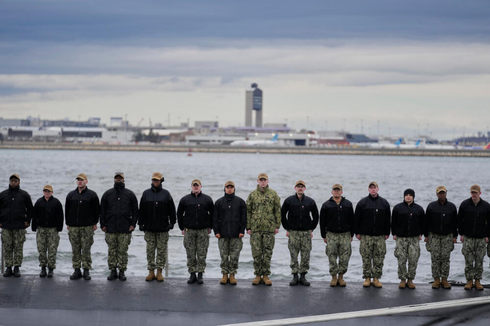 Sailors stand at attention on the USS Massachusetts during a rehearsal ahead of the commissioning (Robert F. Bukaty/AP)
