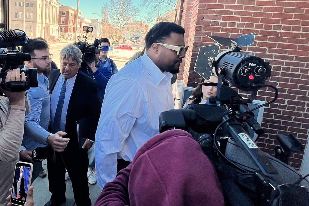 New England Patriots defensive lineman Christian Barmore arrives at Attleboro District Court for his arraignment on a domestic assault and battery charge Monday, March 9, 2026, in Attleboro, Mass. (Kimberlee Kruesi/AP)