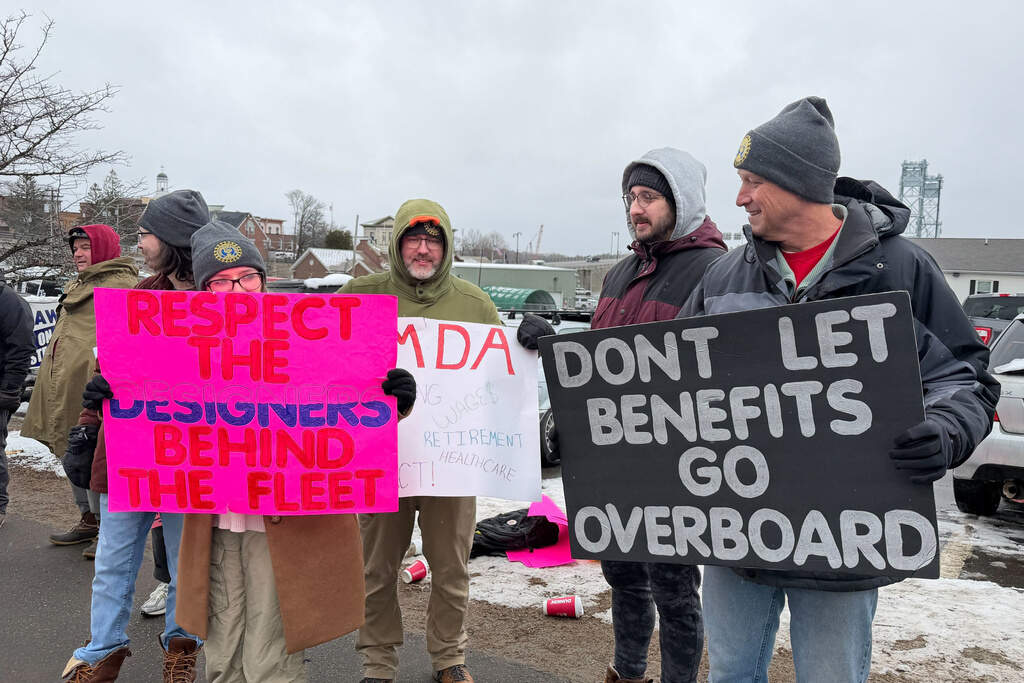 Strikers picketing outside Bath Iron Works in Bath, Maine, on Monday, May 23, 2026. (Rodrique Ngowi/AP)
