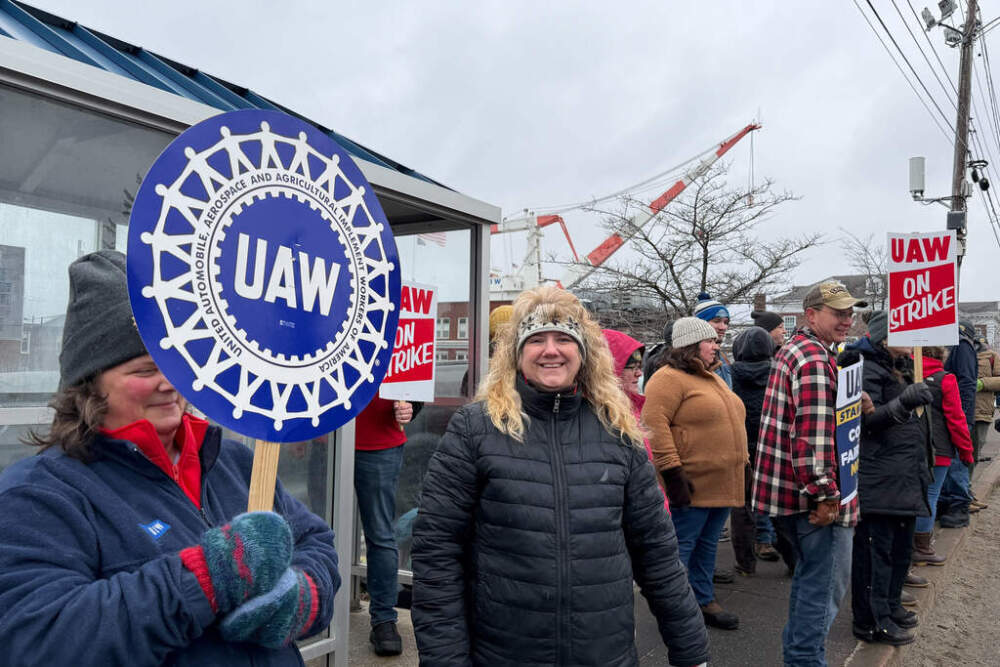 Members of the Bath Marine Draftsmen's Association, a UAW union, picket outside Bath Iron Works, May 23, 2026. (Rodrique Ngowi/AP)