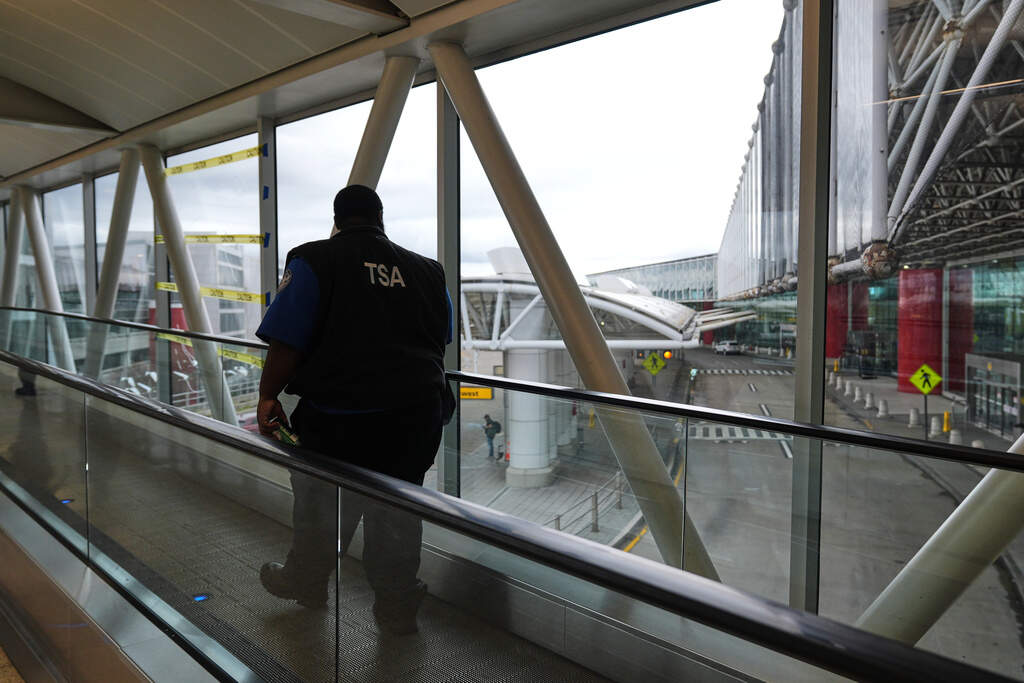 A Transportation Security Administration agent leaves the terminal following their shift at Baltimore/Washington International Thurgood Marshall Airport in Baltimore, Monday, March 23, 2026. (Stephanie Scarbrough/AP)