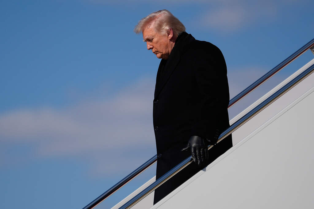 President Donald Trump arrives on Air Force One, Wednesday, March 18, 2026, at Joint Base Andrews, Md., after attending the casualty return at Dover Air Force Base, Del., for the six crew members of an Air Force refueling aircraft who died when their plane crashed in western Iraq while supporting operations against Iran. (AP Photo/Julia Demaree Nikhinson)